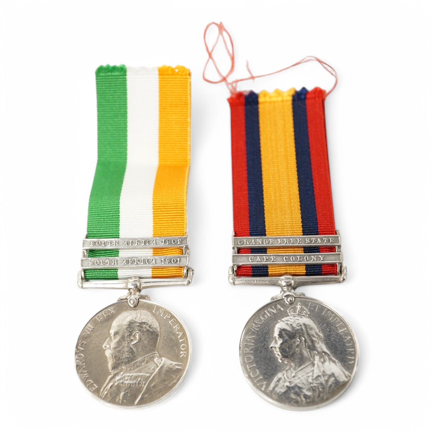 Two Boer War medals; a Queen’s South Africa Medal with clasps for Cape Colony and Orange Free State, together with a King’s South Africa Medal with clasps for South Africa 1901 and South Africa 1902. Condition - fair, bo